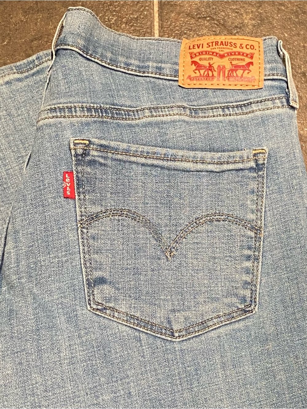 Levi's Women's Light Blue Straight Leg Jeans with Signature Red Tab